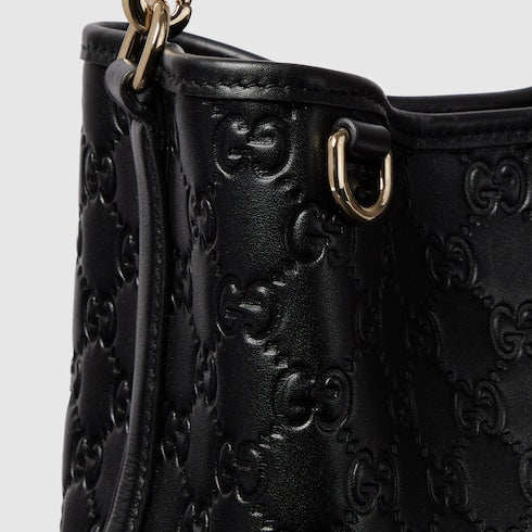 Emblem small bucket bag