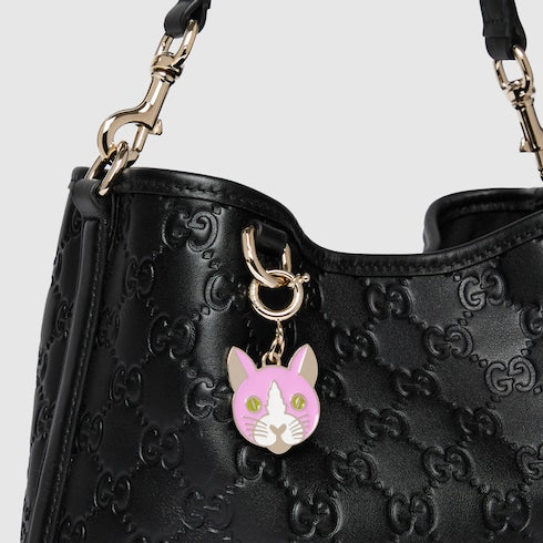 Emblem small bucket bag