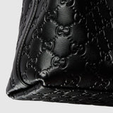 Emblem small bucket bag